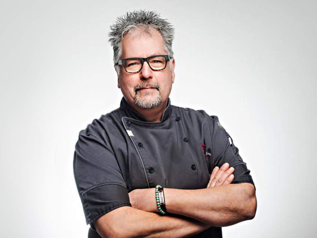 Picture of famous, Chef D with arms crossed